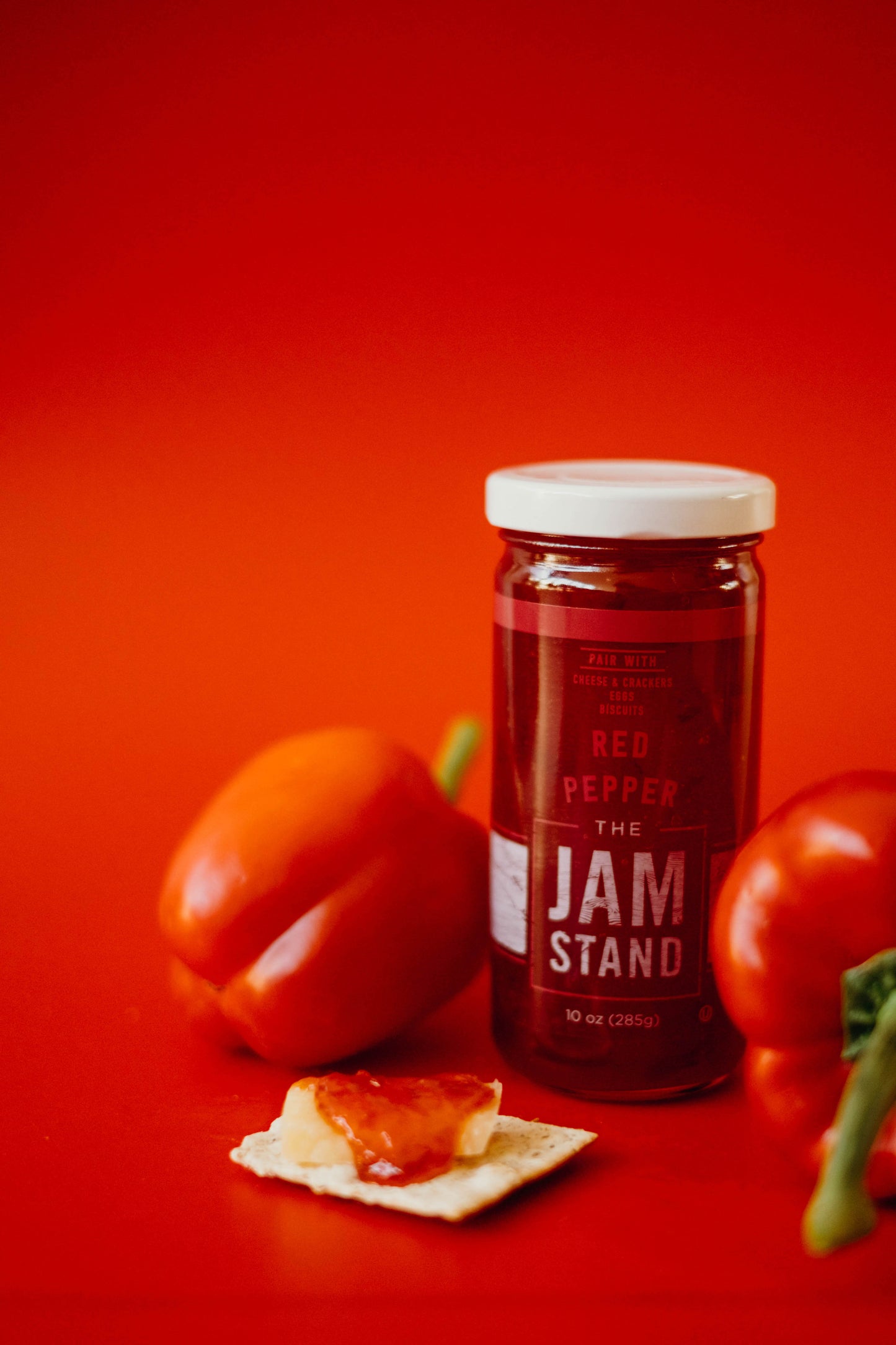 red pepper jelly with crackers and cheese