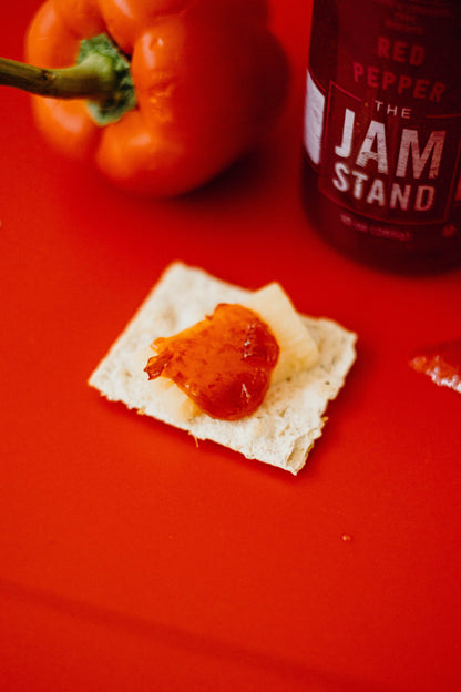 sweet red pepper jelly with cheese and crackers